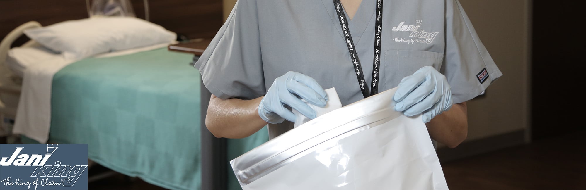 EVS medical cleaning staff cleaning a hospital room.