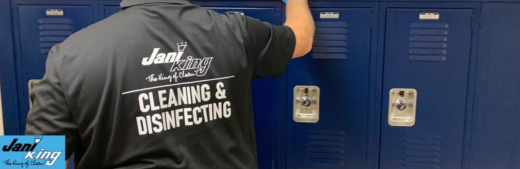 Jani-King employee cleaning school lockers.