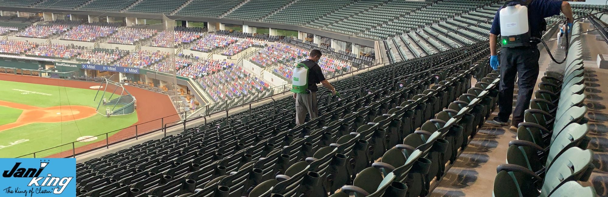 Jani-King employees cleaning stadium seats.