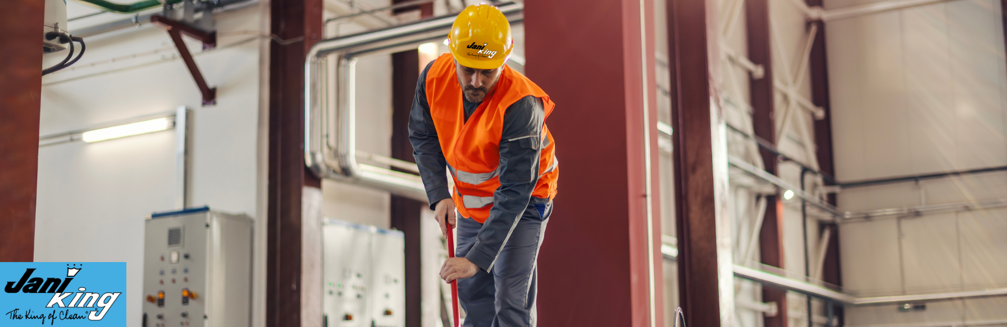 Jani-King employee cleaning post construction site.