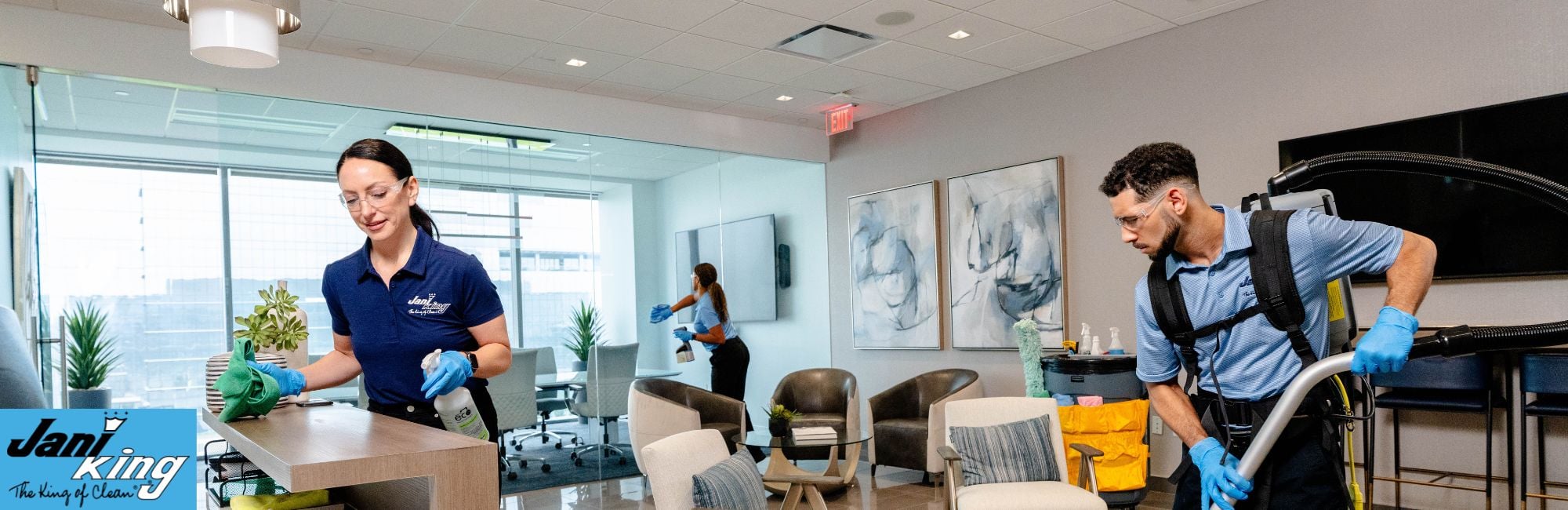 Jani-King employees sanitizing an office.