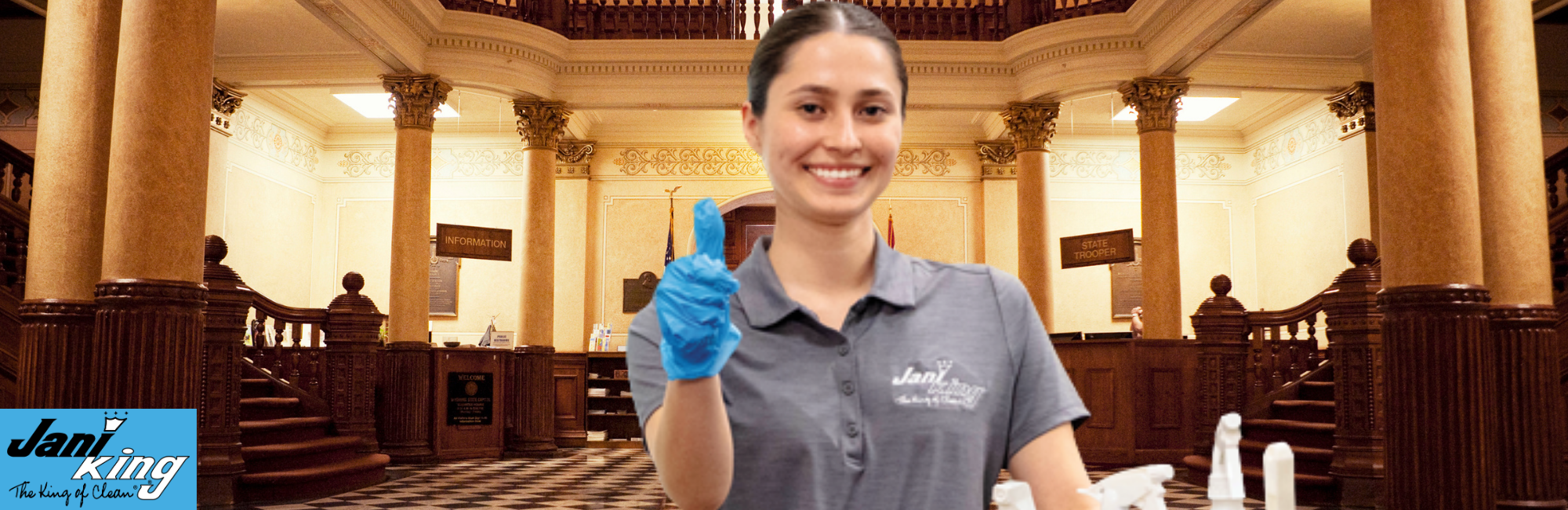 Jani-King employee cleaning a government building.