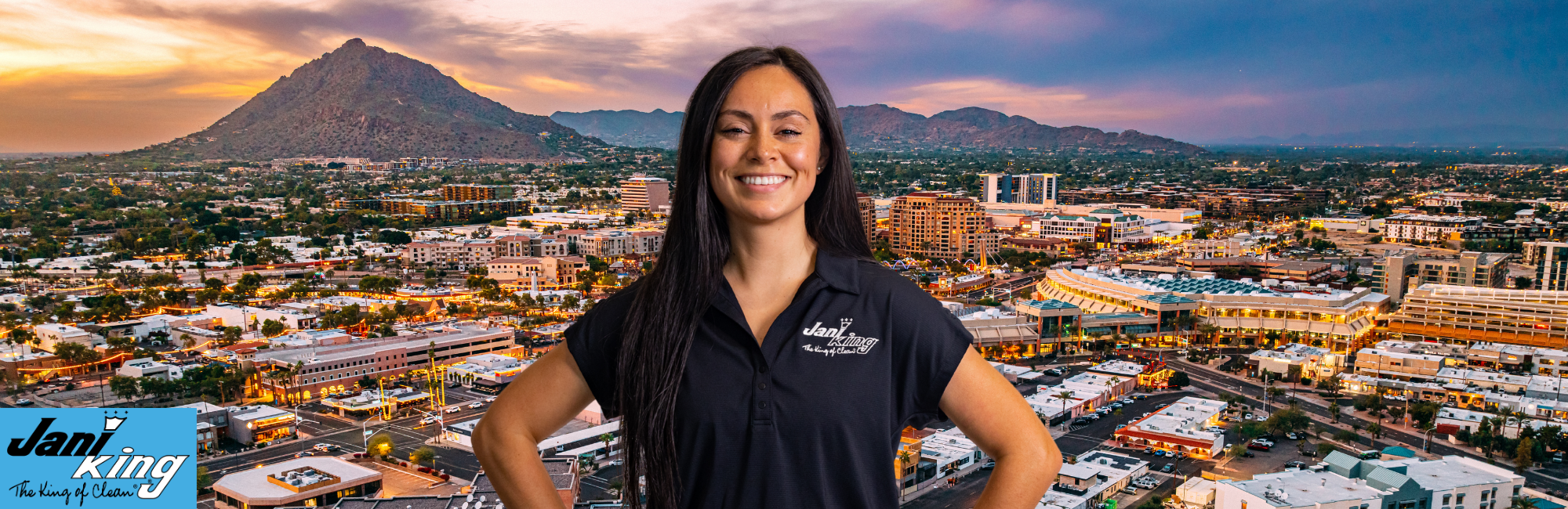 Jani-King employee Infront of the city of Pheonix.