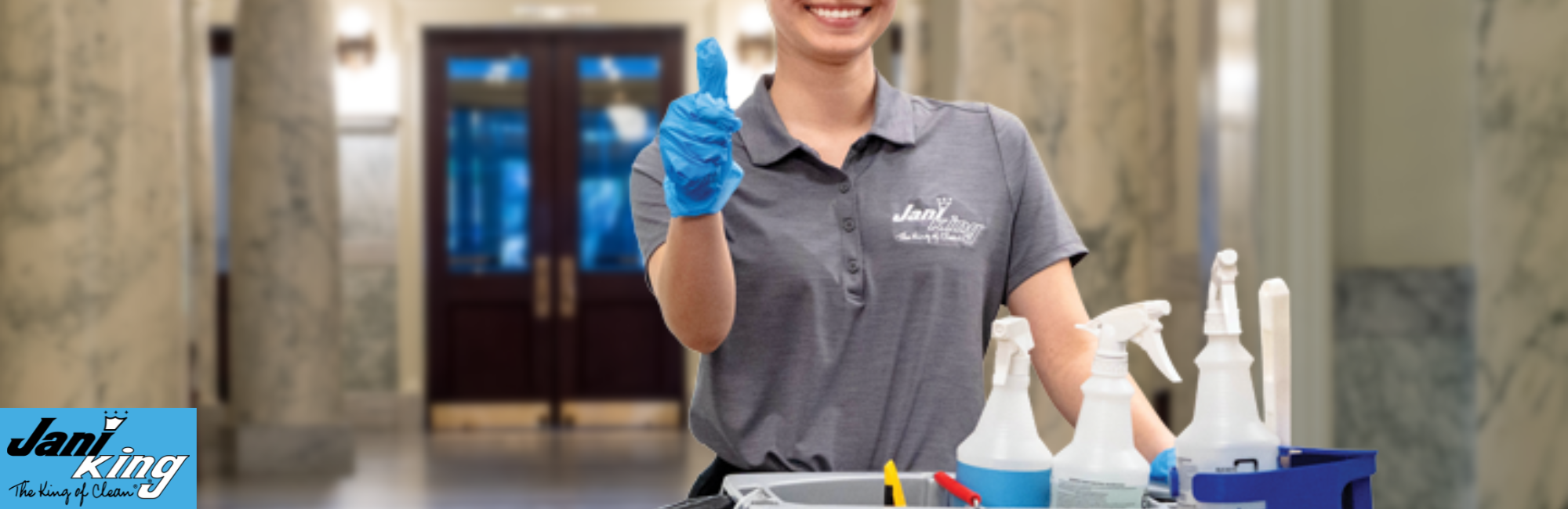 Jani-King employee cleaning a government building.